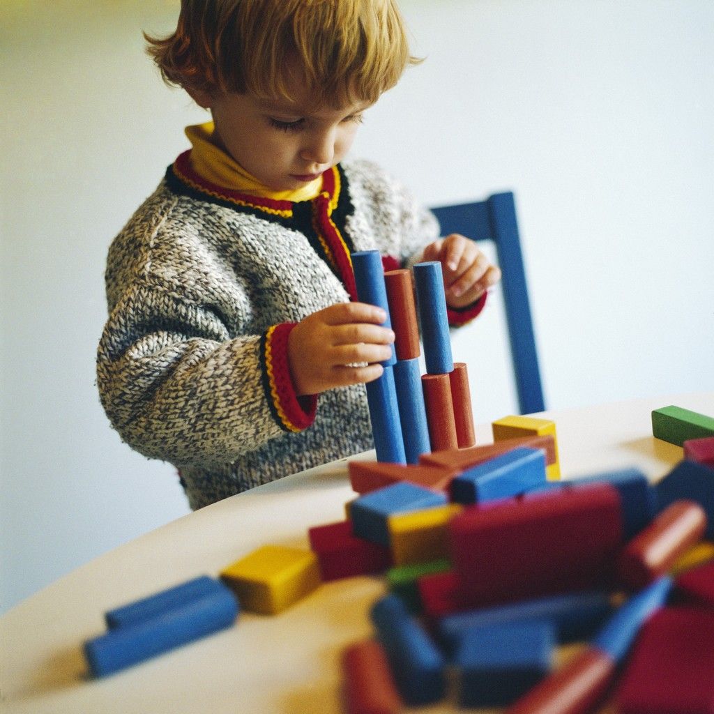 Boy Playing with Building Blocks